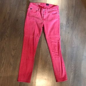 AG faded red ankle jeans